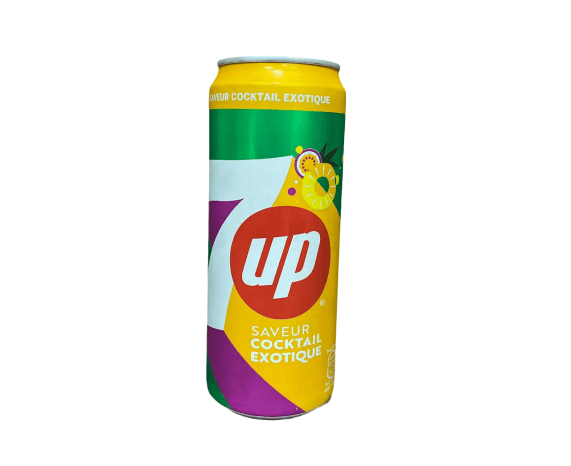 Sweet Palace Cocktail Exotique 7up beverage in a glass with colorful fruit garnishes and a straw, served chilled.