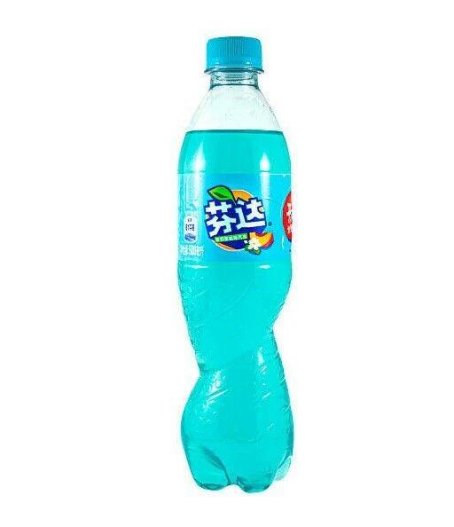 Fanta Jasmine Peach beverage by Sweet Palace, clear bottle showing the peach-flavored soda with a jasmine hint.