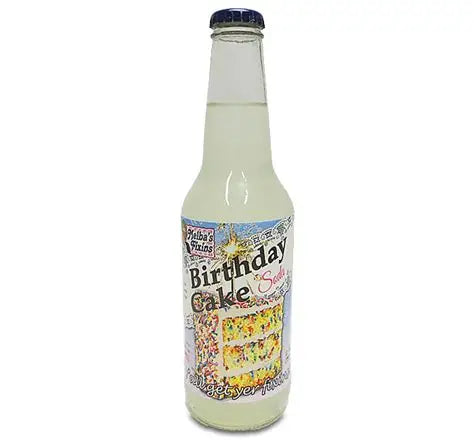 Sweet Palace Melba's Fixins Soda with butterscotch flavor in a clear glass bottle, showing the colorful soda inside.