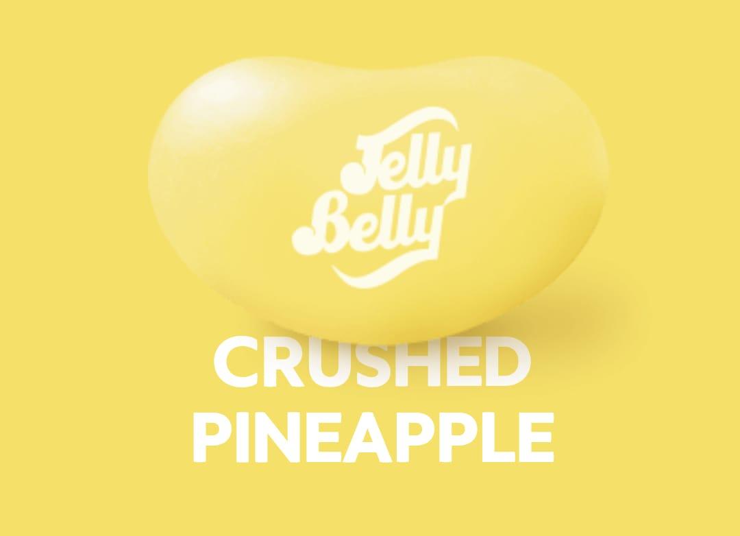 Sweet Palace Jelly Belly crushed pineapple candy in a 0.5-pound bag, vibrant yellow and textured with crushed pineapple pieces.