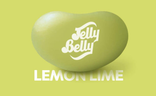 Assorted Jelly Belly Lemon Lime candy beans from Sweet Palace in a clear bowl, showcasing bright yellow and green colors.
