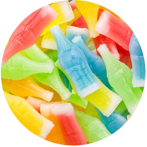 Colorful wax candy bottles from Sweet Palace, shaped like vintage candy, in assorted bright colors and glossy finishes.