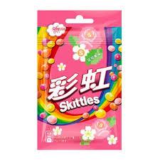 Colorful Skittles fruit candies from Sweet Palace, showcasing vibrant, fruit-flavored candies in a variety of bright colors.