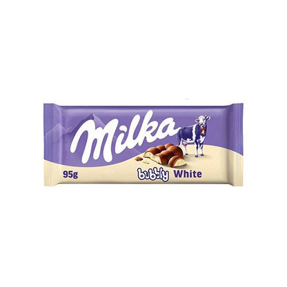Sweet Palace Milka chocolates, Alpine milk candy with purple packaging, showcasing creamy milk-filled chocolate pieces.