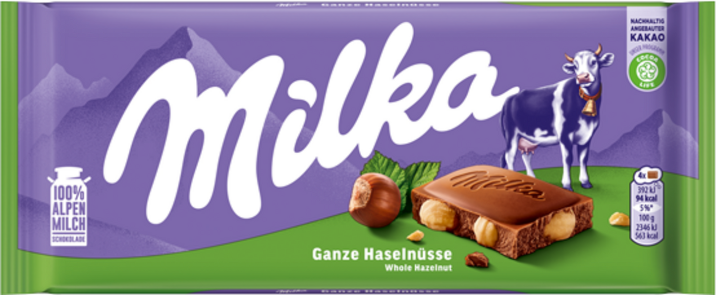 Sweet Palace Milka chocolates, creamy Alpine milk candy bars with purple packaging and Milka branding, on a white background.