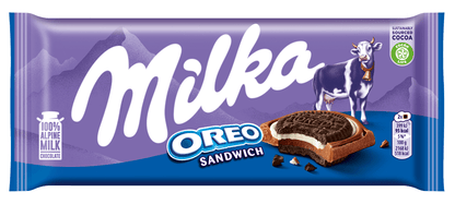 Sweet Palace Milka chocolates in alpine milk flavor, showcasing a colorful candy box with individually wrapped chocolate pieces.