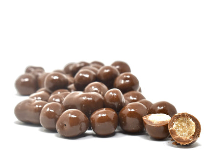 Sweet Palace chocolate-covered peanuts, a close-up of glossy, crunchy nuts coated in rich chocolate in a 1-2 lb bag.
