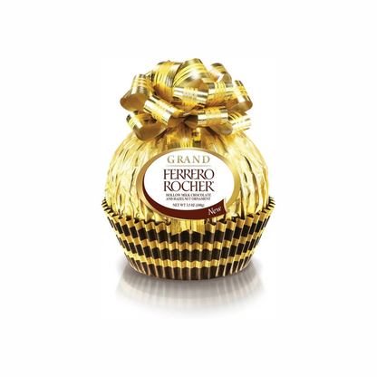 Assorted Ferrero Rocher chocolates from Sweet Palace, featuring golden foil-wrapped hazelnut chocolates with textured packaging.