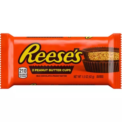 Sweet Palace Reese's chocolates and cups, featuring peanut butter cups and assorted chocolate pieces on a white background.