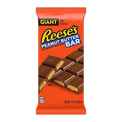 Sweet Palace Reese's chocolates and cups in colorful wrappers, showcasing the classic peanut butter cups and assorted chocolates.