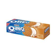 Sweet Palace Oreo Cinnamon Bun cookie showing a golden-brown cookie with cinnamon swirl and creamy filling.