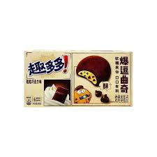 Sweet Palace Chip's Ahoy milk chocolate filled cookie showing a partially bitten cookie with creamy chocolate filling inside
