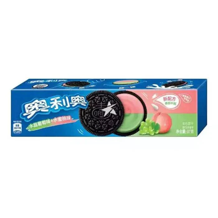 Sweet Palace Oreo Grape Peach Cookies, colorful cookies with grape and peach flavor, displayed on a plate with vibrant fruit accents.