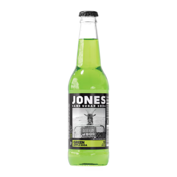 Sweet Palace Jones Glass Bottle filled with cream soda, clear glass bottle with vintage-style label, on a plain background.