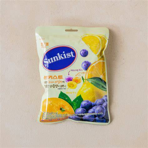 Haitai Sunkist Fruit Candy package from Sweet Palace featuring colorful fruit-flavored candies in a bright wrapper.