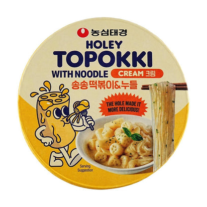 Sweet Palace Holey Topokki Cream Sauce flavor with glass noodles, showing a bowl of spicy Korean rice cake dish with creamy sauce