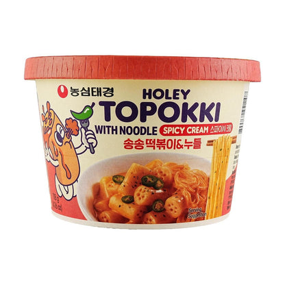Spicy cream flavor Holey Topokki with glass noodles from Sweet Palace, served in a bowl with vibrant toppings and sauce.