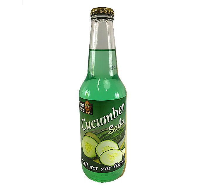 Cucumber soda in a clear glass bottle from Lester's Fixins by Sweet Palace, showing fresh cucumber slices inside.