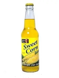 Lester's Fixins Sweet Corn Soda by Sweet Palace in a clear glass bottle with colorful label, showcasing the unique corn soda flavor.