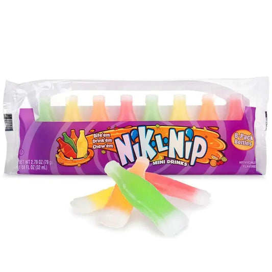 Eight Nik-L-Nip wax candy bottles in colorful packaging, created by Sweet Palace, displayed in a close-up shot.