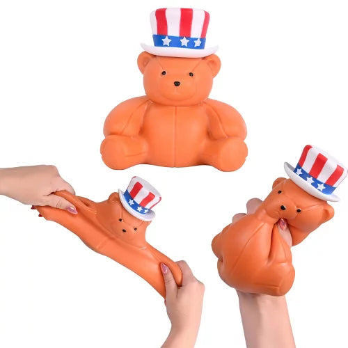 Original Squeeezy Americana Teddy Bear by Sweet Palace, soft plush toy with patriotic red, white, and blue colors, featuring a cheerful expression.