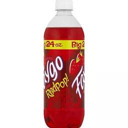 Faygo Redpop drink in a clear glass with vibrant red soda and ice cubes, showcasing the Sweet Palace beverage brand.