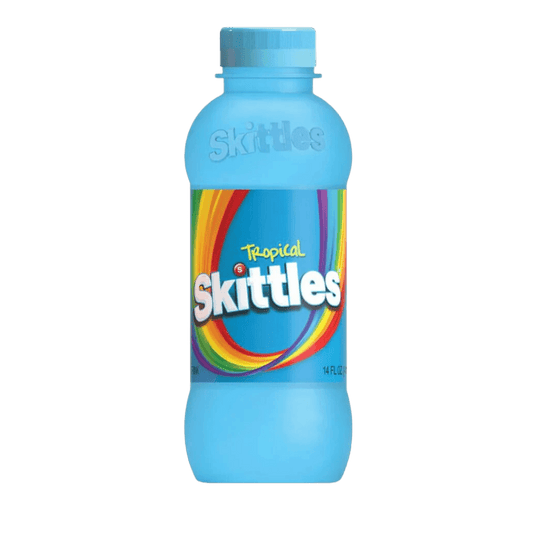 Refreshing Skittles Tropical Drink from Sweet Palace, colorful beverage with tropical fruit flavors in a clear glass.