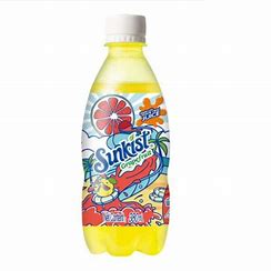 Sweet Palace Sunkist Grapefruit drink in a clear glass with grapefruit slices and ice, refreshing fruit beverage.