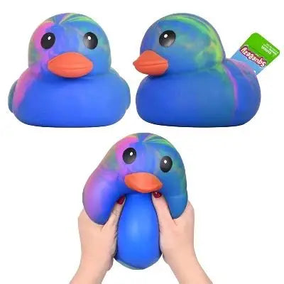 Multicolored Original Squeeezy Duck by Sweet Palace, soft squeeze toy with vibrant rainbow hues and a playful duck shape.