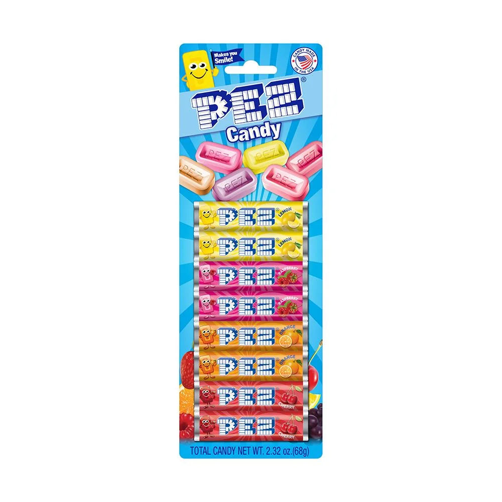 Assorted fruit-flavored PEZ 8-pack refill candies from Sweet Palace, with colorful packaged PEZ candy refills.