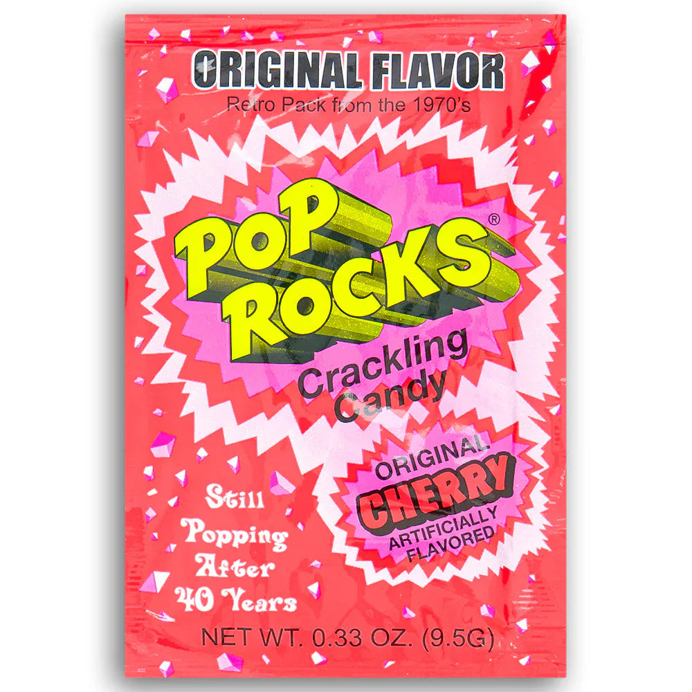 Sweet Palace Cherry Pop Rocks popping candy in a clear container, showing colorful granules and vibrant packaging.