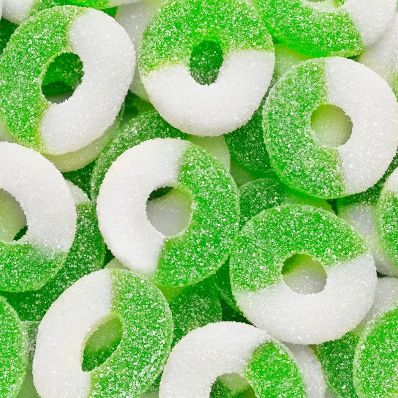 Sweet Palace peach gummy rings, colorful and chewy candy, displayed in a close-up view showing their vibrant texture and shape.
