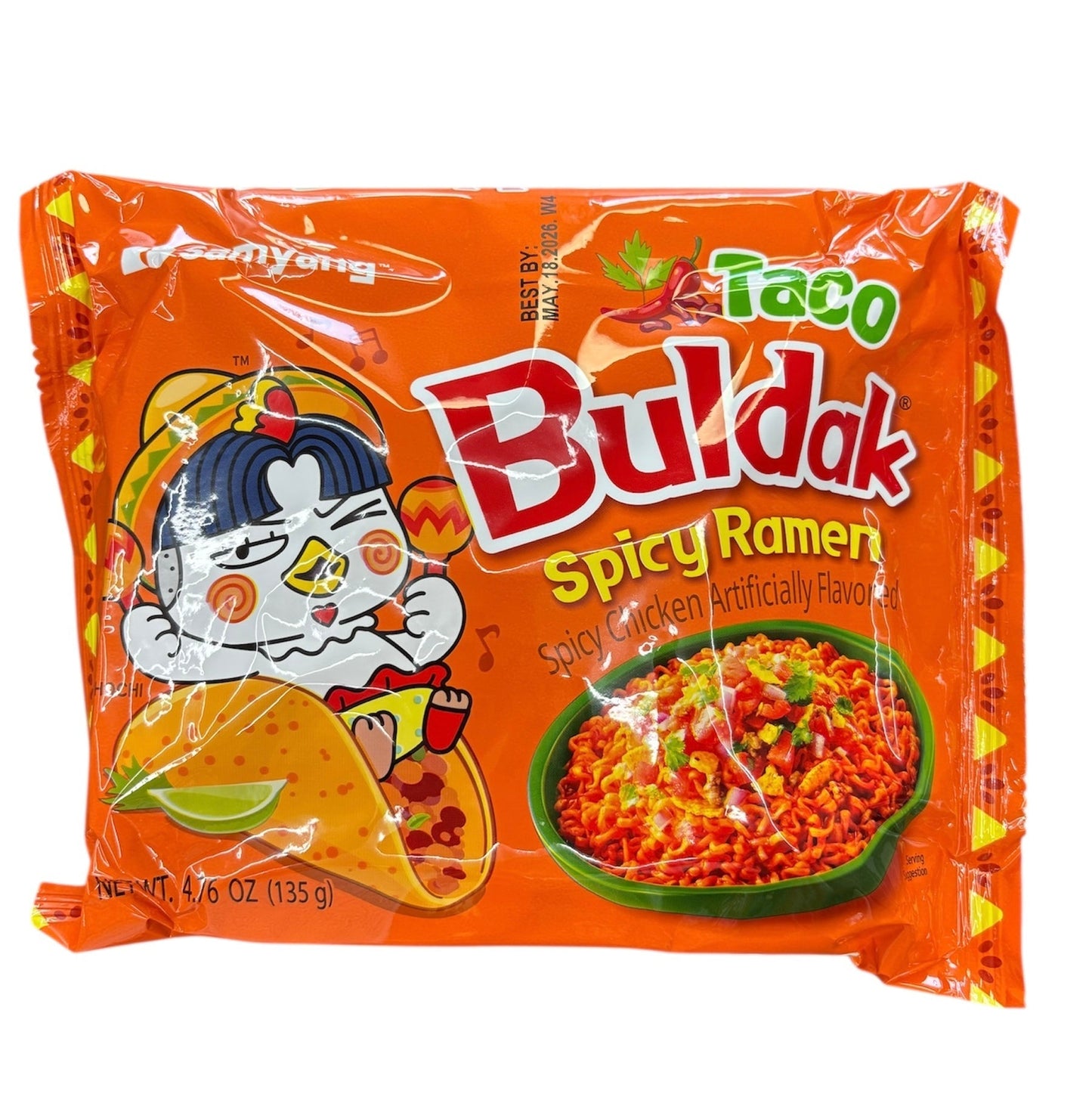Spicy Buldak Taco ramen from Sweet Palace in a bowl with noodles, sauce, and toppings, ready to enjoy.