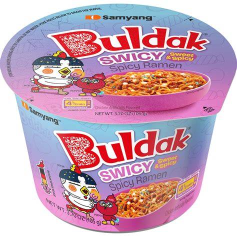 Spicy Buldak Swicy ramen in a bowl with noodles, sauce, and toppings from Sweet Palace, ready to enjoy a flavorful meal.