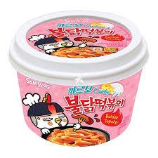 Spicy Buldak Topokki Carbonara flavor ramen from Sweet Palace with creamy sauce and chewy rice cakes in a hot, flavorful dish