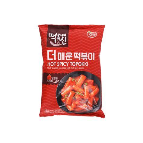Sweet Palace Dongwon Hot & Spicy Topokki Ramen rice cake trays with spicy sauce and chewy rice cakes in a tray.