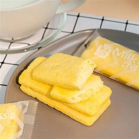 Sweet Palace Milk Classic Rice Snack in 8.53oz bag, showing crispy, milk-flavored rice snack pieces in a colorful package.