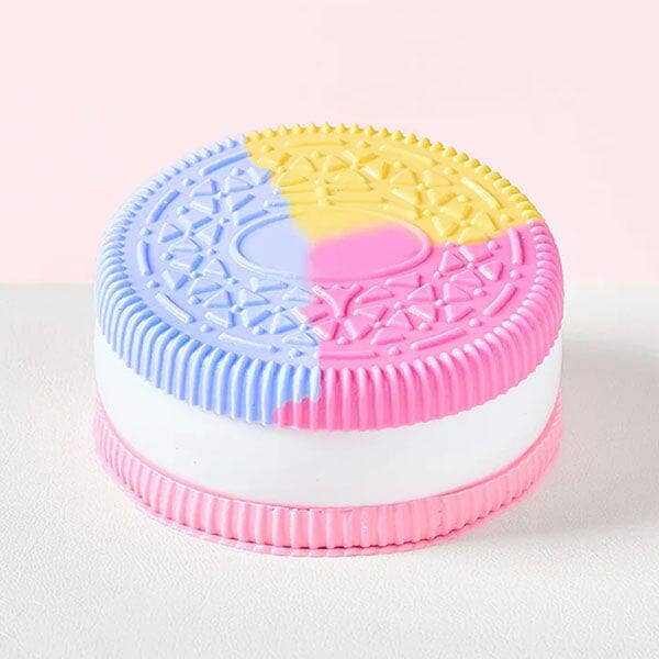 SqueezeSquad Taba Deluxe silicone squishy fidget toy resembling a sandwich cookie, from The Autism Store.