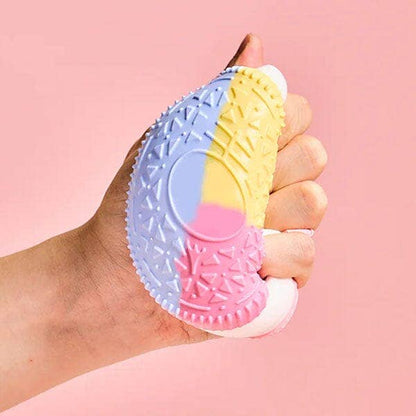 SqueezeSquad Taba Deluxe silicone sandwich cookie fidget toy by The Autism Store, soft, squeezable, and textured for sensory play.
