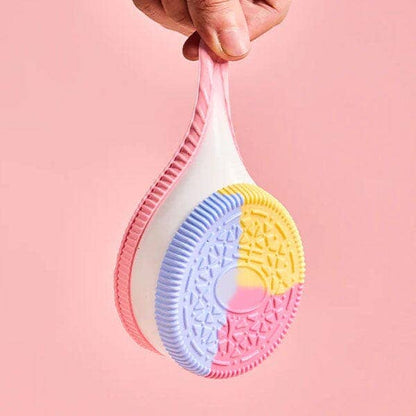 SqueezeSquad Taba Deluxe silicone sandwich cookie squishy fidget toy by The Autism Store, soft and squeezable for stress relief and sensory play.