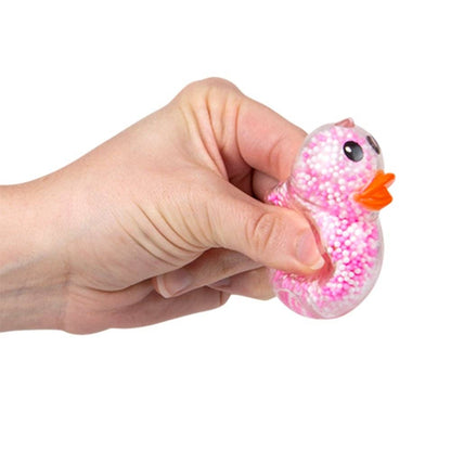 Yellow 2.3-inch mini squeezy foam bead ducky from The Autism Store, soft and squeezable sensory toy for children.