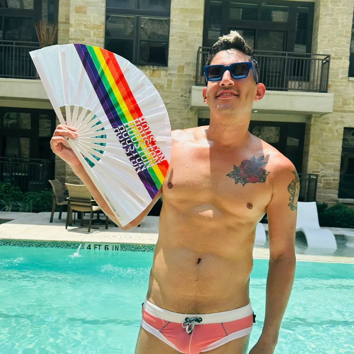Houston Pride Clack Fan by The Gay Fan Club, a colorful hand fan featuring vibrant Houston Pride-themed design.