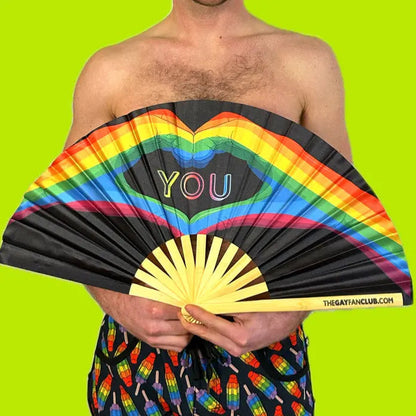 Hand fan from The Gay Fan Club with "Love You" design, featuring colorful, decorative artwork perfect for expressing affection.