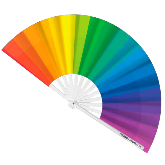 White hand fan with rainbow design featuring the "Over The Rainbow" motif by The Gay Fan Club.
