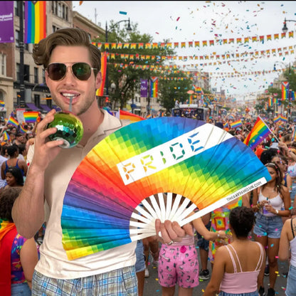 Hand fan featuring vibrant rainbow Pride colors from The Gay Fan Club, perfect for supporting LGBTQ+ celebrations.