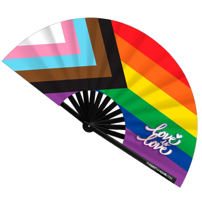 Hand fan featuring the Pride rainbow flag design by The Gay Fan Club, with vibrant rainbow colors and a compact, foldable style.