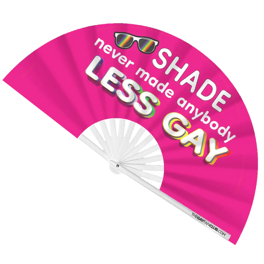 Hand fan from The Gay Fan Club featuring the "Shade Never Made Anybody Less Gay" slogan on a colorful design.