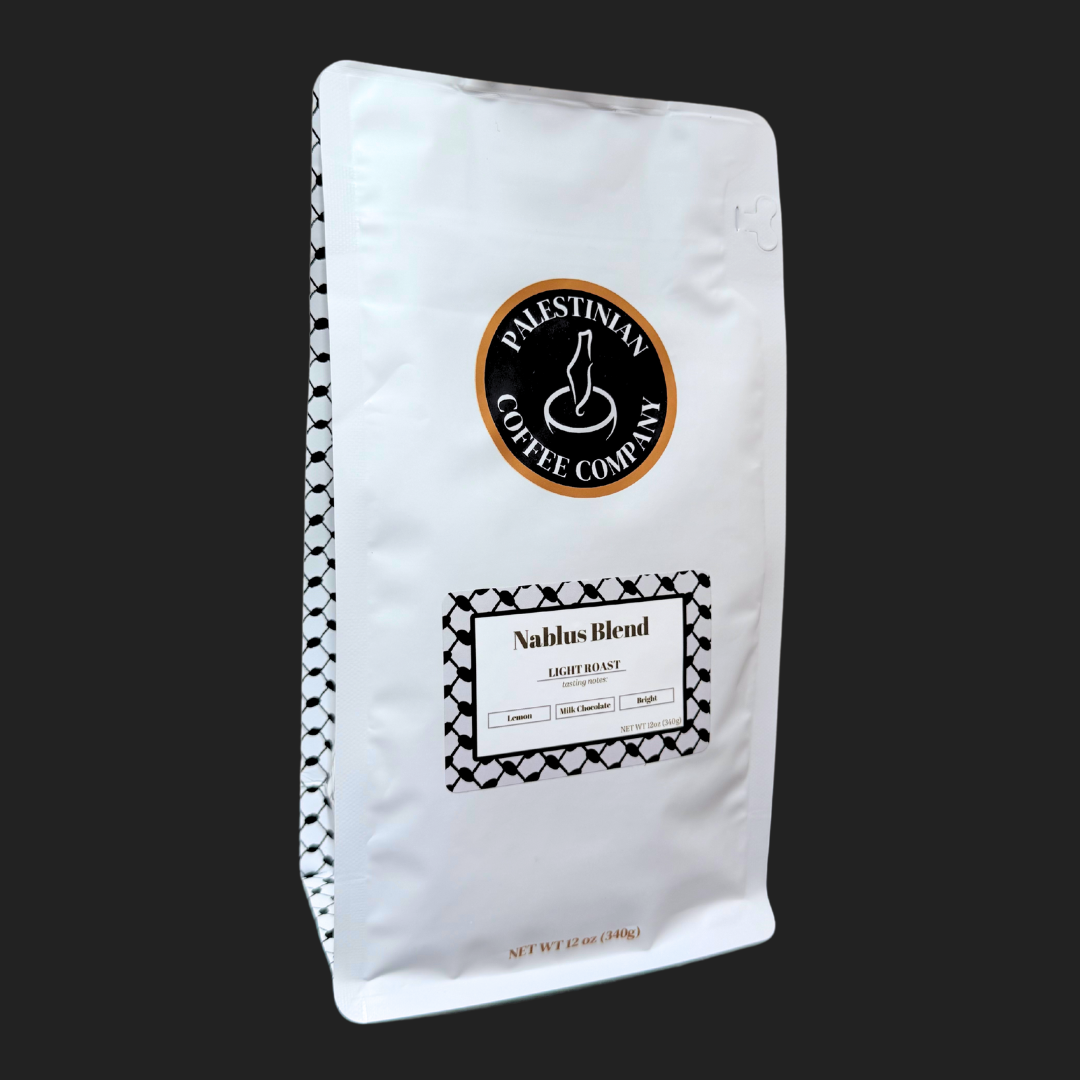 Whole bean Nablus Blend light roast coffee by The Palestinian Coffee Company, showing a 12 oz bag of Palestinian coffee.