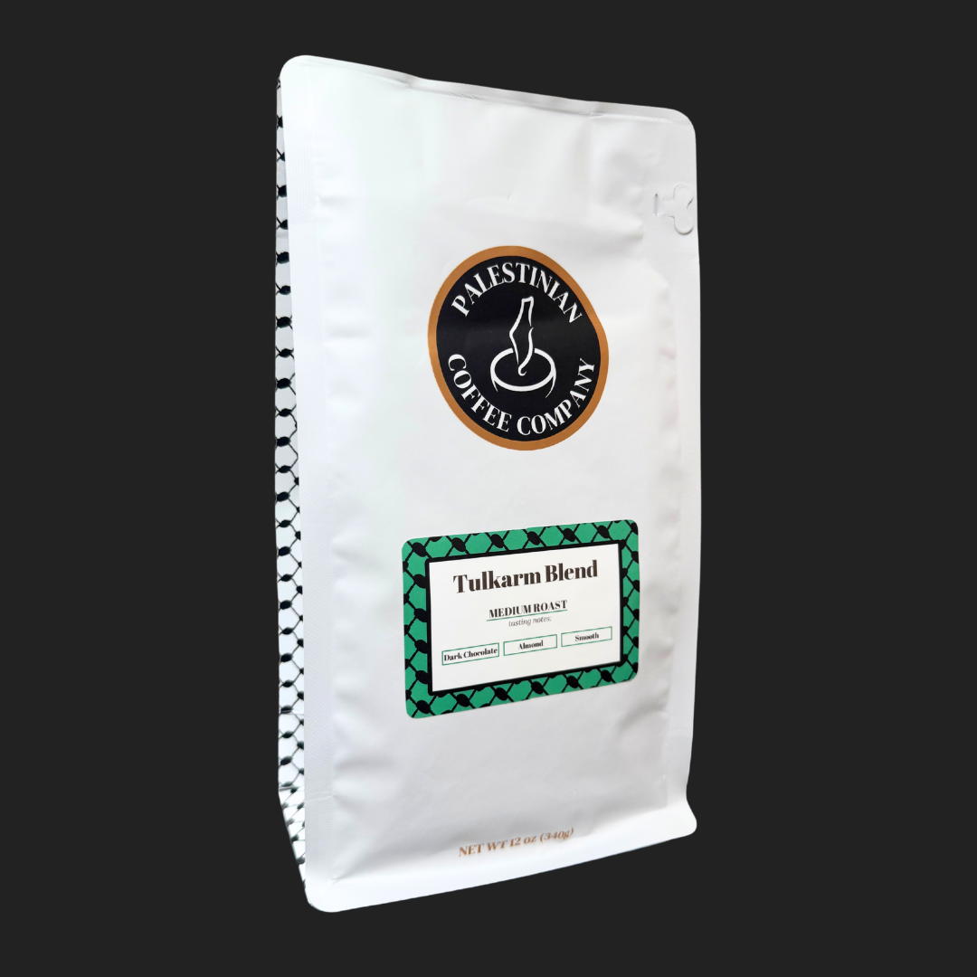 Whole 12 oz bag of Tulkarm Blend medium roast coffee beans by The Palestinian Coffee Company, featuring rich, aromatic coffee beans.