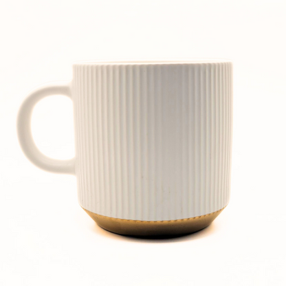 Black ceramic mug from The Palestinian Coffee Company with Pali Coffee Co branding, perfect for hot beverages.